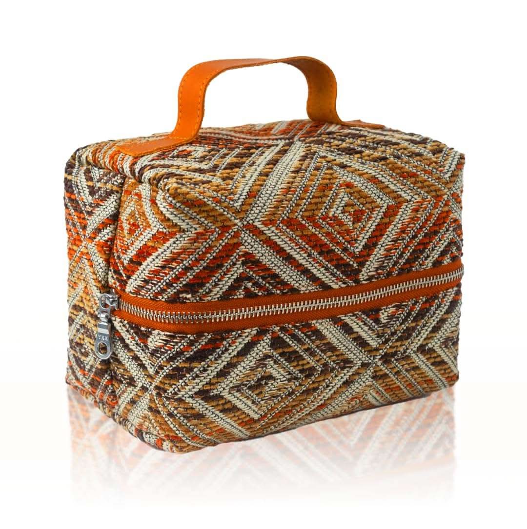 Compact woven travel makeup bag with textured design for organizing cosmetics