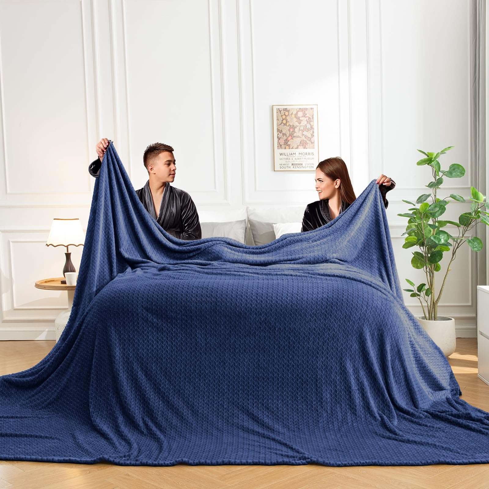 Oversized King Throw Blanket 120x120 inches draped on couch for cozy warmth and softness