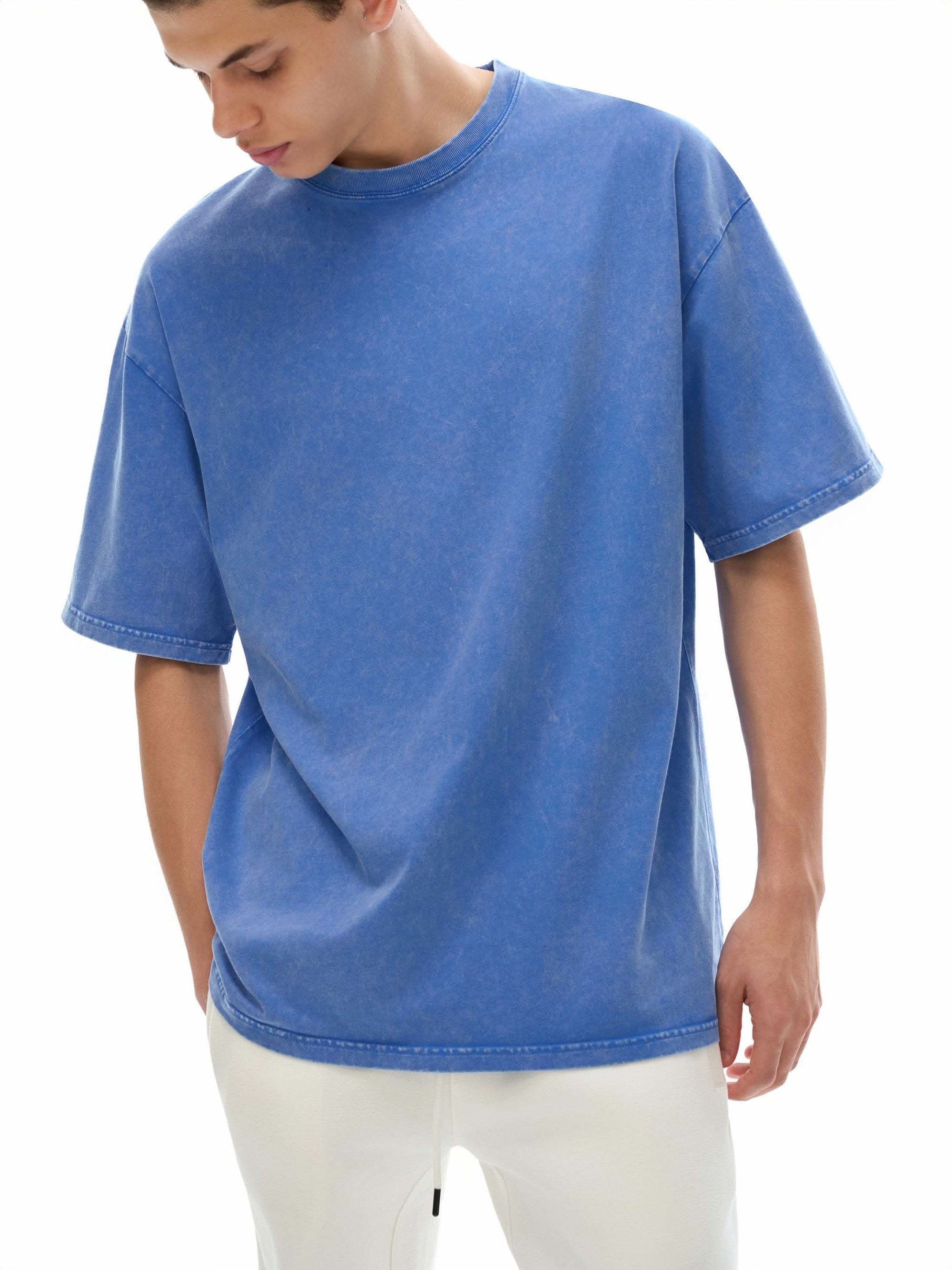 Snow washed oversized cotton t-shirt in black by ODMPOD, featuring a relaxed fit and casual style.