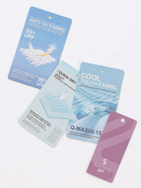 Essential Sorona Boxy T-Shirt fabric tags showing UV protection, quick-dry, cool touch, and Sorona Agile features