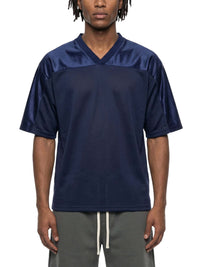 Oversized mesh V-neck soccer jersey with breathable fabric and raglan sleeves in retro 90s style