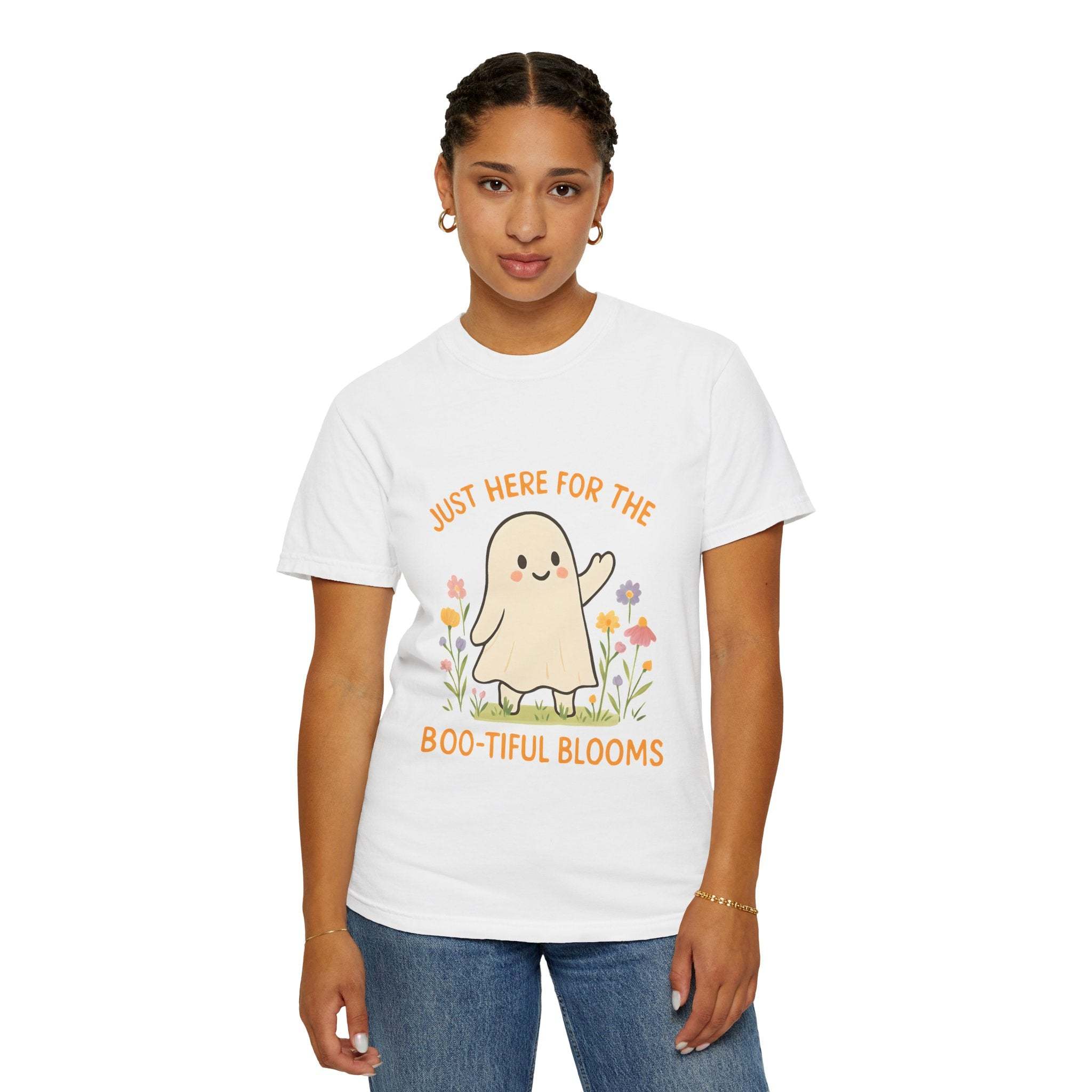woman wearing white floral ghost unisex Halloween T-shirt with cartoon ghost and flowers design