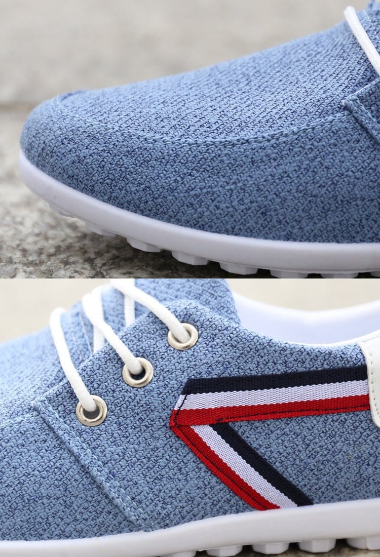 Men's soft-soled blue canvas shoes with round toe and color stitching detail