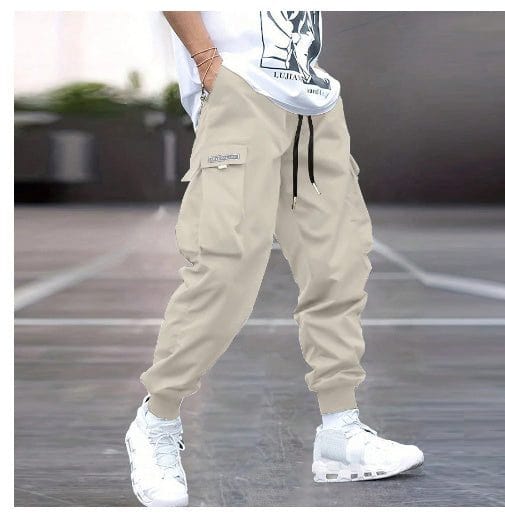 Men's beige multi-pocket cargo pants with drawstring waist, casual hip-hop style outdoor streetwear trousers