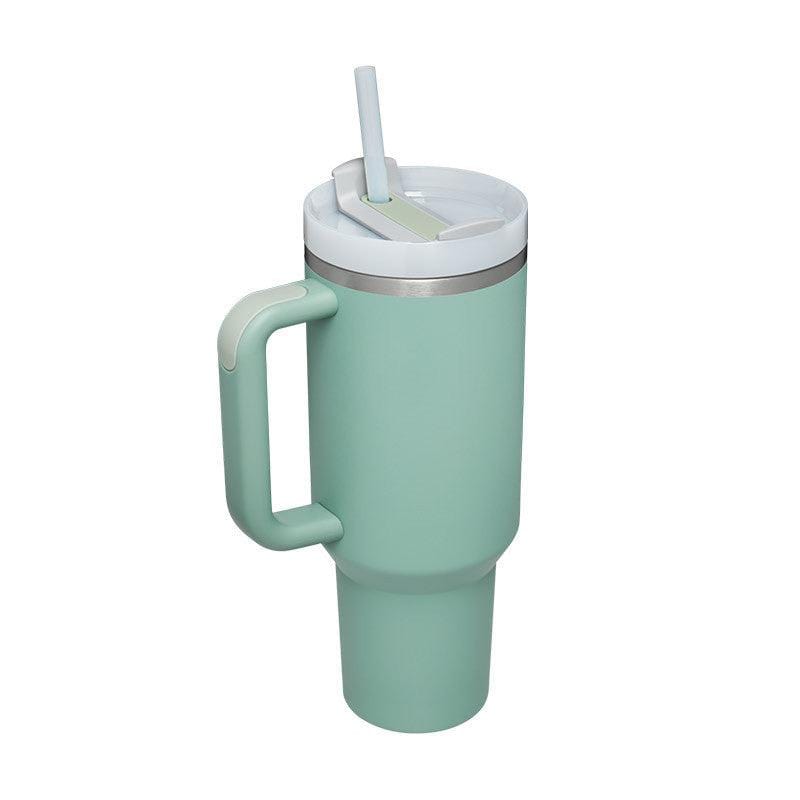 Mint green 40oz insulated stainless steel tumbler with handle, spill-proof lid, and straw for hot and cold beverages.