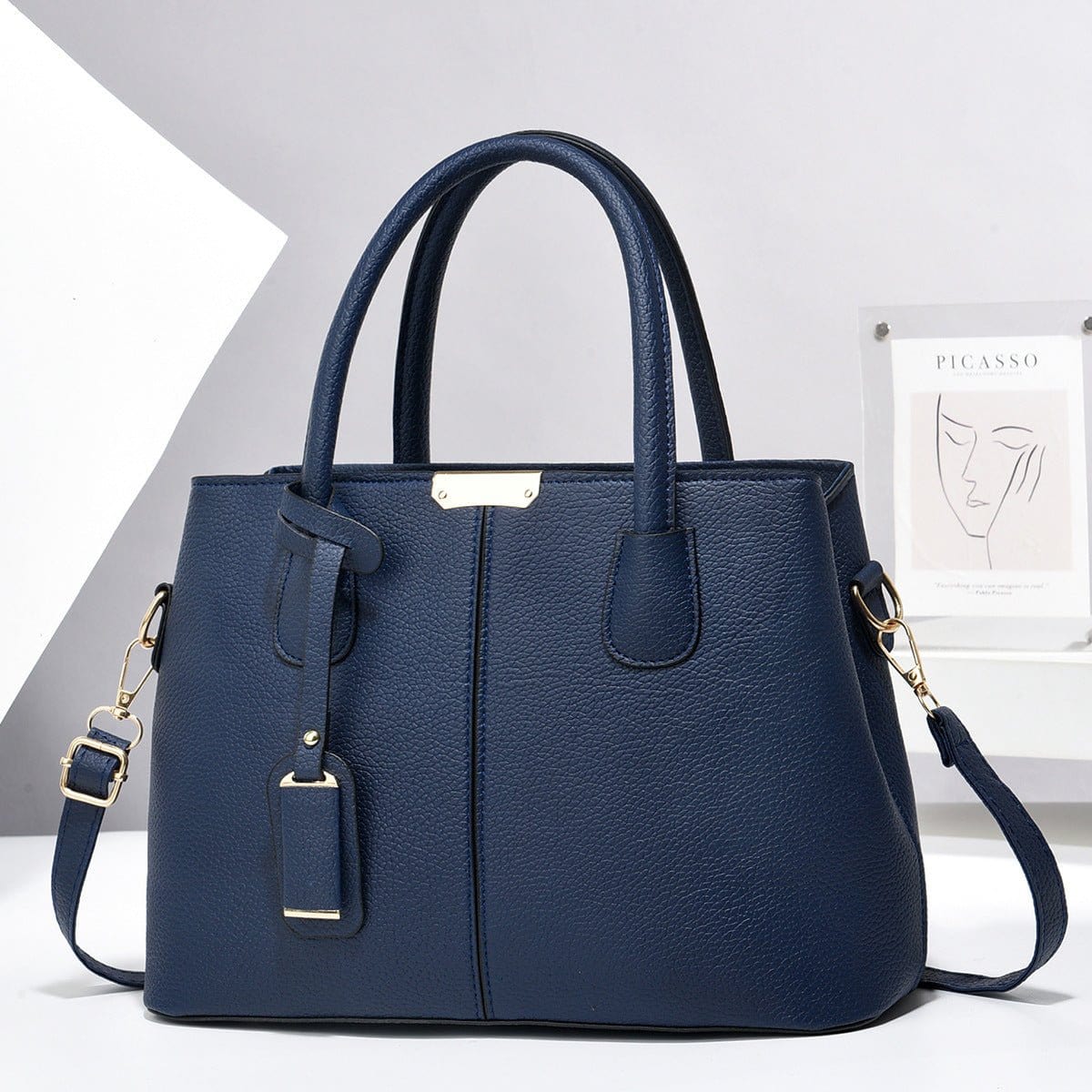 Navy blue women PU leather handbag with large capacity tote and crossbody strap, stylish square shoulder bag.