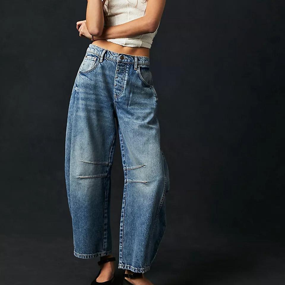 Women's high stretch mid-rise wide leg denim jeans in blue with loose, baggy fit and casual style