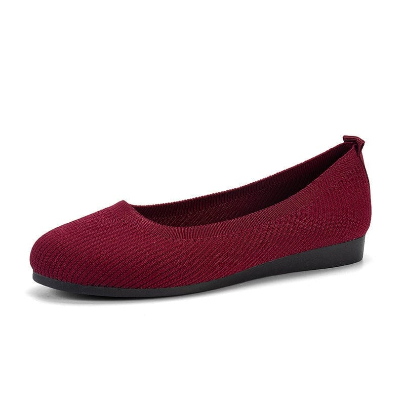 Burgundy round toe flats with soft knit mesh upper and low flat rubber sole for casual comfortable wear