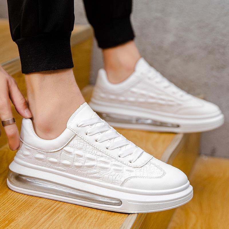 Trendy white leather men's casual sneakers with air-cushioned rubber sole and stylish stitching design