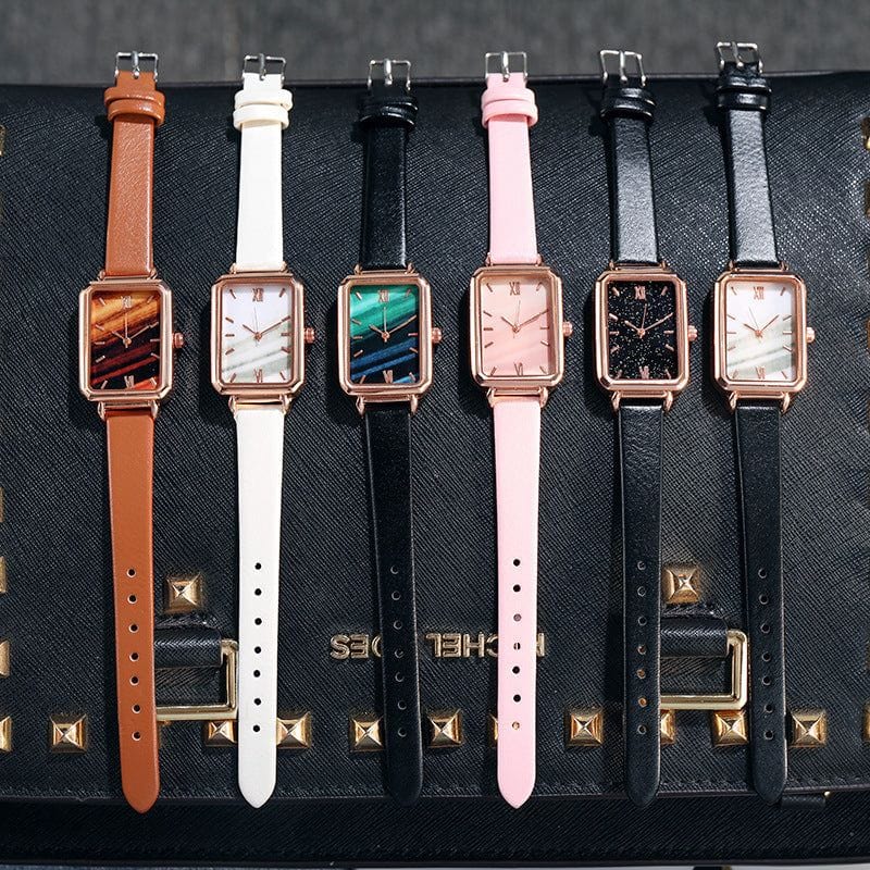 Set of five retro style rectangle dial watches with various colored straps and unique patterned faces including retro green peacock design