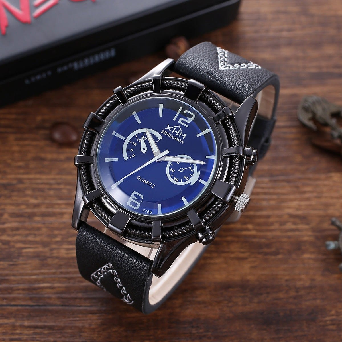 Men’s quartz watch with black PU leather strap, round dial, and stainless steel back, part of a fashion creative gift set including belt, tie, cufflinks, and wallet.