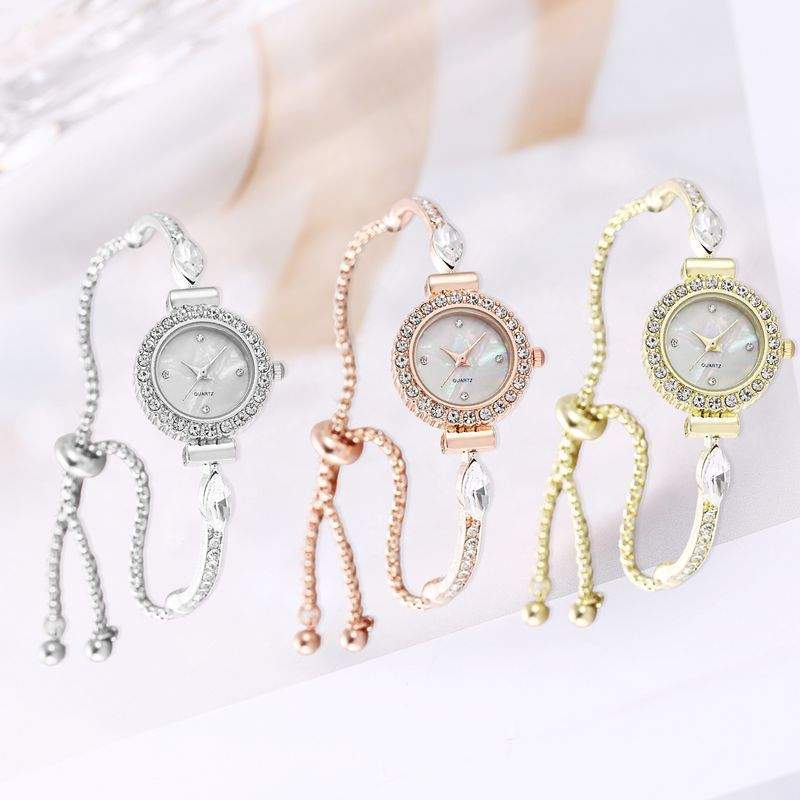 Diamond Dial Decorative pull-out bracelet watch with adjustable band and sparkling dial