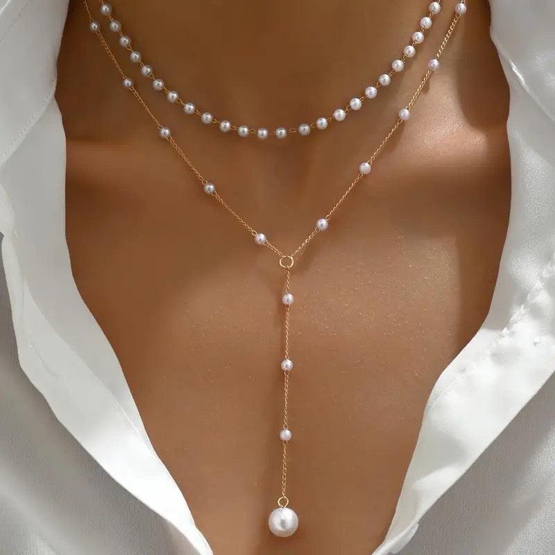 Elegant Pearl Double Layer twin pearl necklace with gold chain on model wearing white blouse