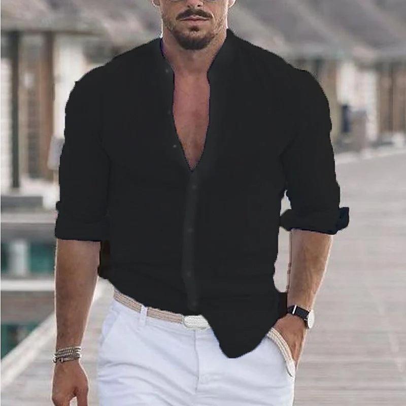 Men's casual long sleeve black shirt with buttons, rolled sleeves, and a relaxed fit.