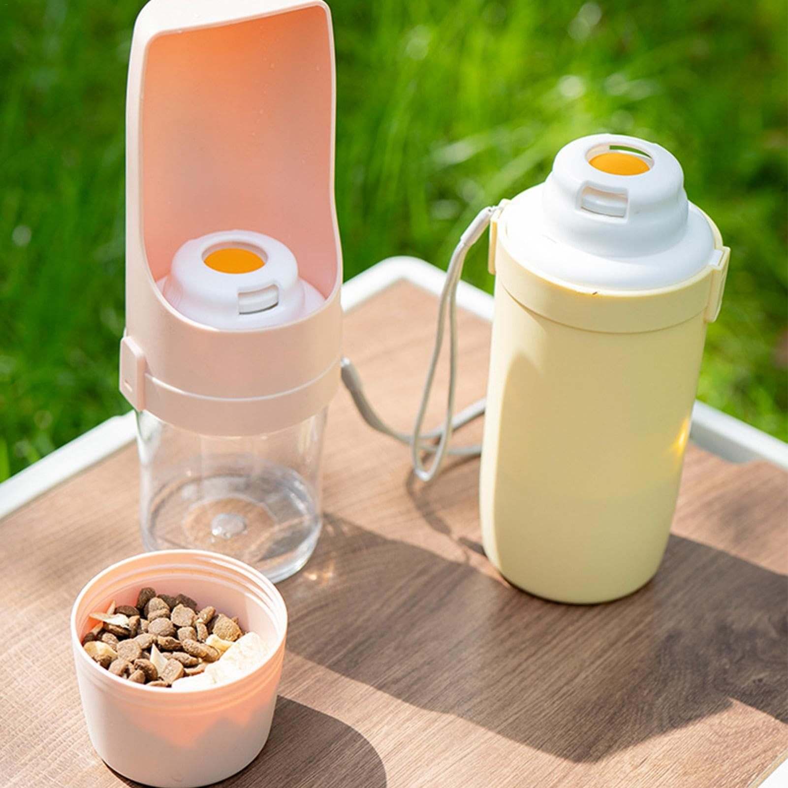 Portable 2-in-1 travel dog water bottle and food dispenser with leakproof design and lanyard for outdoor use