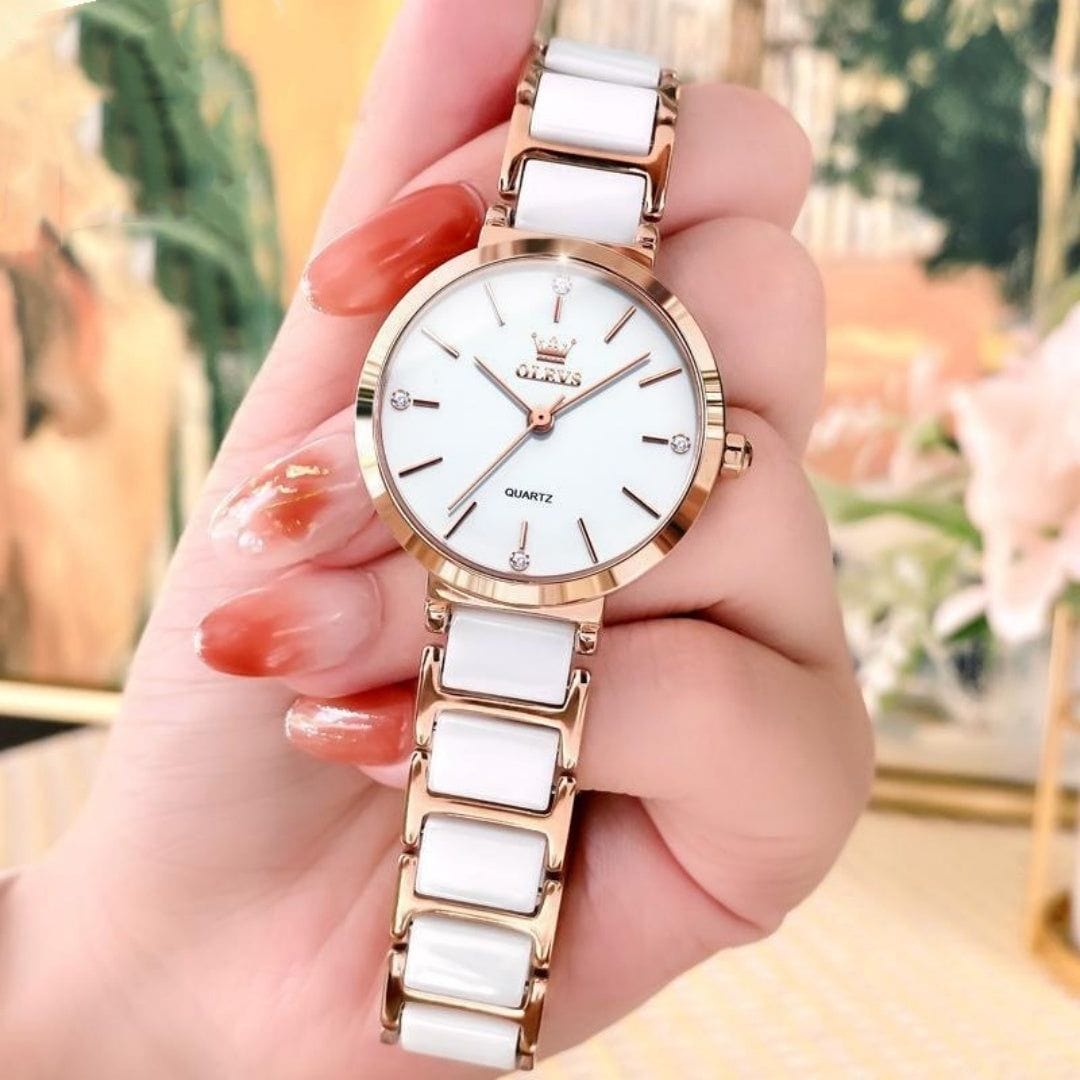 Womens Fashionable Waterproof watch with rose gold steel band and black or white ceramic dial