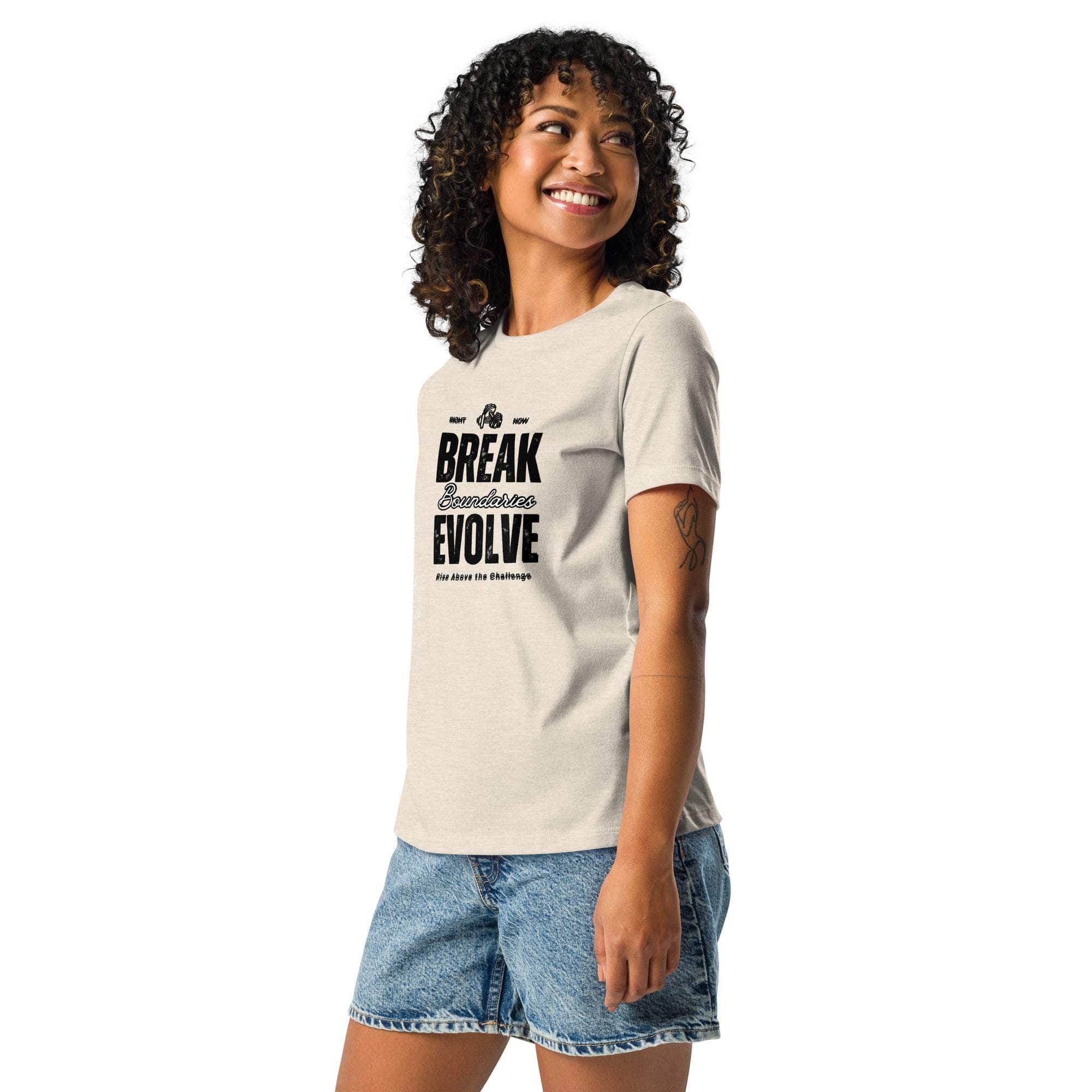 Woman wearing beige Break Boundaries Evolve T-Shirt with inspirational quote and denim shorts
