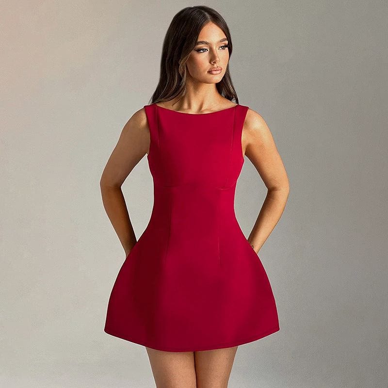 Woman wearing a sexy slim-fitting backless sleeveless red short dress