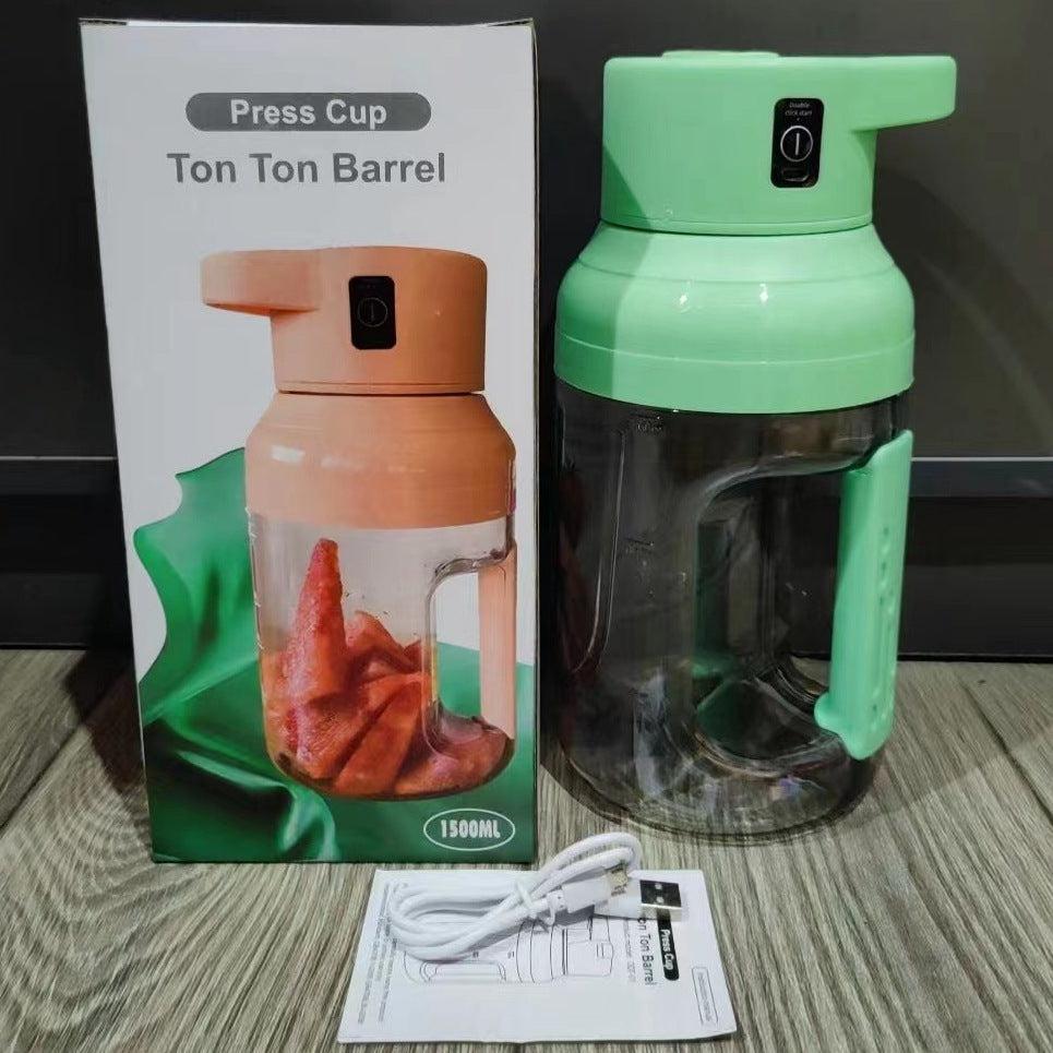 Portable 1500ml summer electric juicer with double handles and USB rechargeable battery in green color next to packaging and charging cable