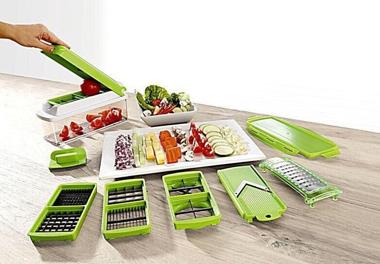 12pcs green food grate food chopper set with interchangeable blades and sliced vegetables on plates for kitchen use