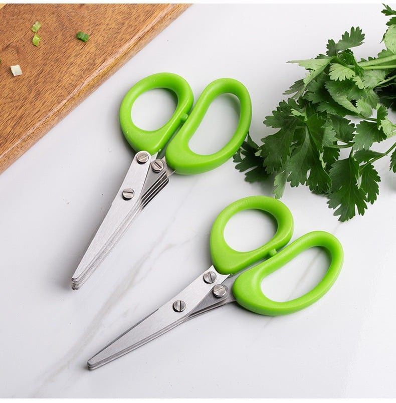 Multifunctional multi-layer green onion scissors with stainless steel blades and green handles for cutting herbs and spices.