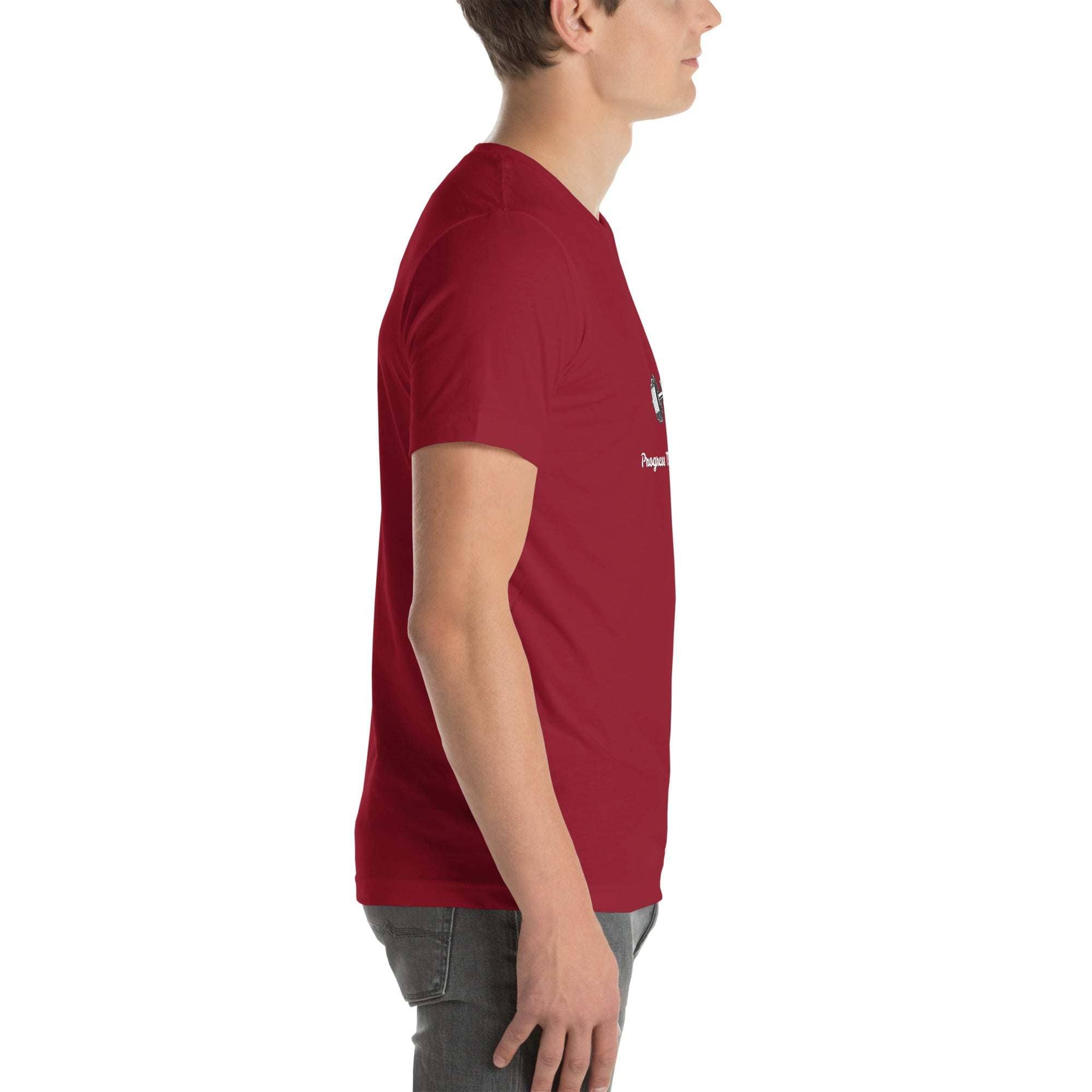 Side view of man wearing red Progress Not Procrastinate T-Shirt with motivational barbell graphic
