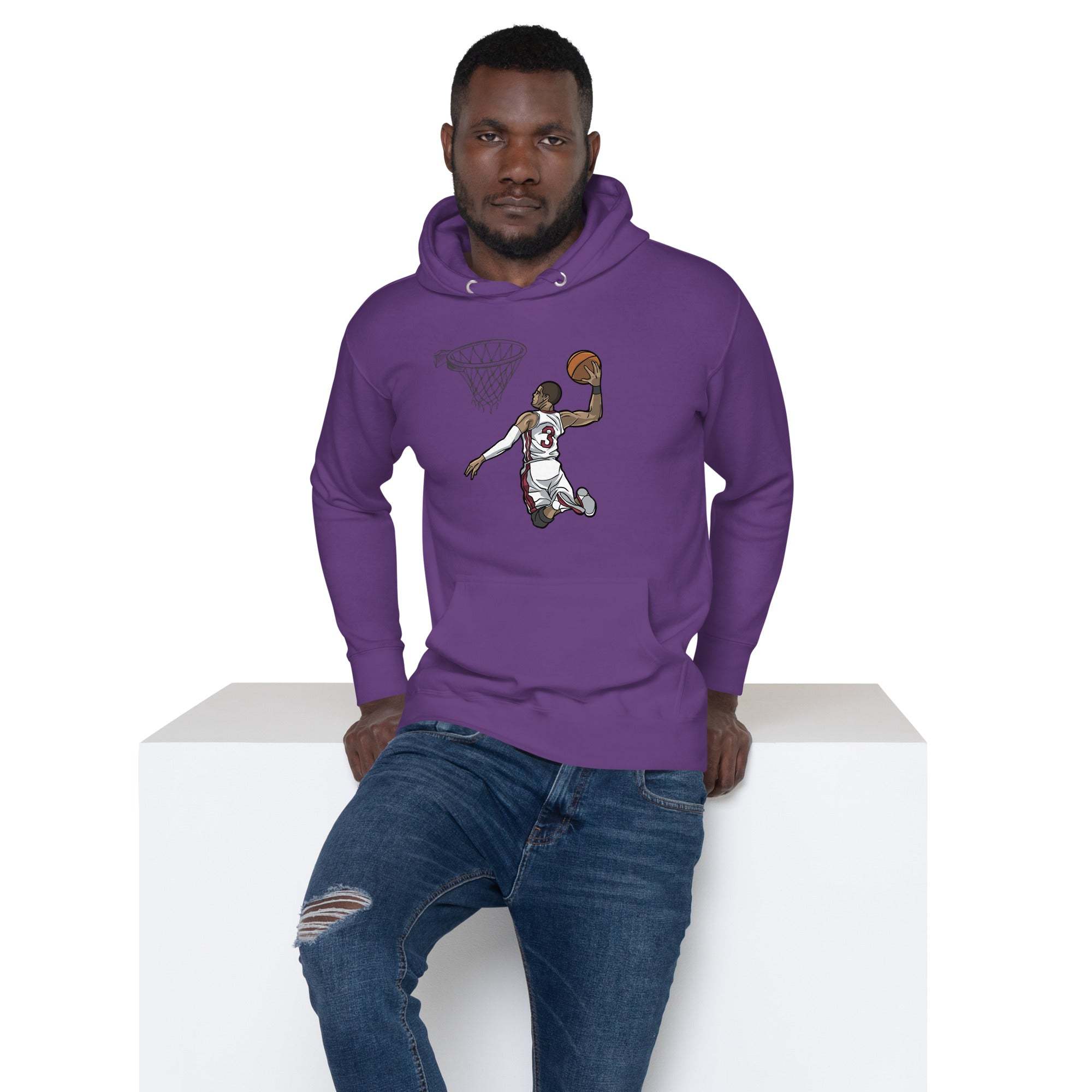 Man wearing purple basketball dunk hoodie with slam dunk graphic sitting on white block