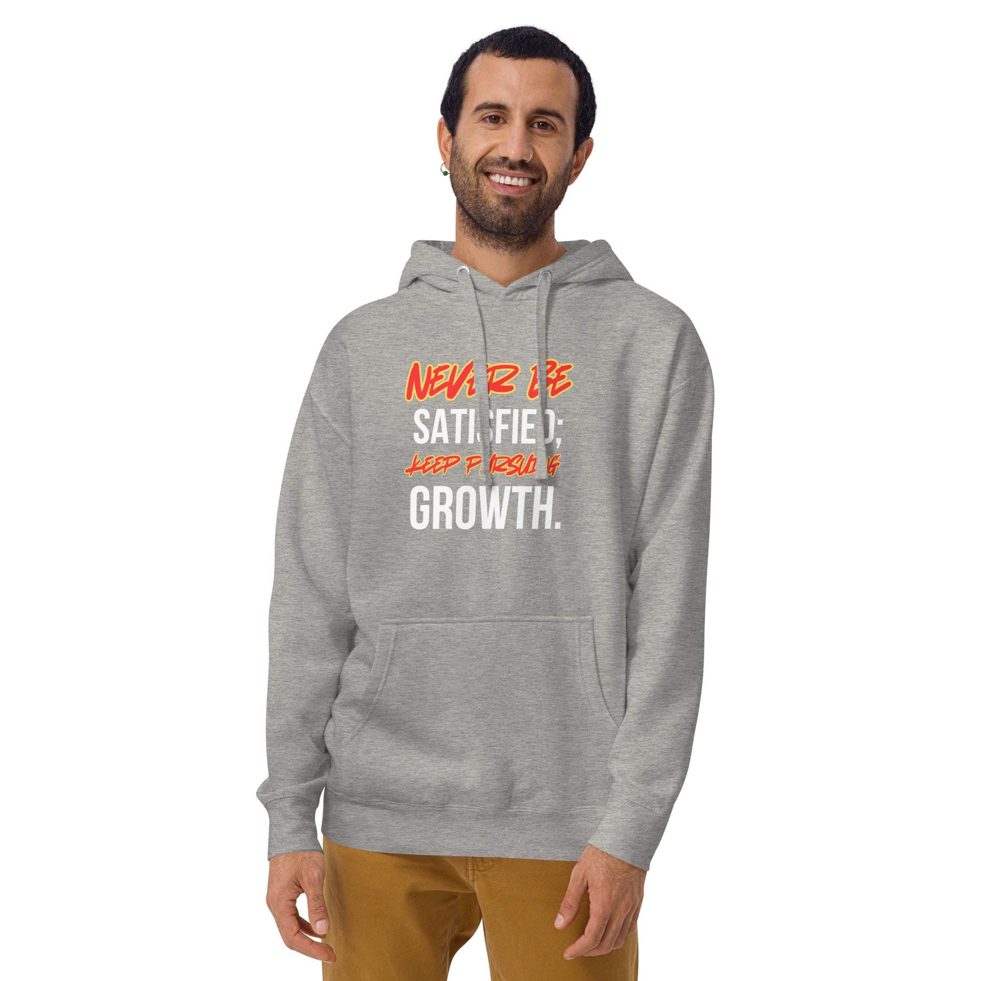 Man wearing grey motivational "Never Be Satisfied, Keep Seeking Growth" hoodie paired with brown pants