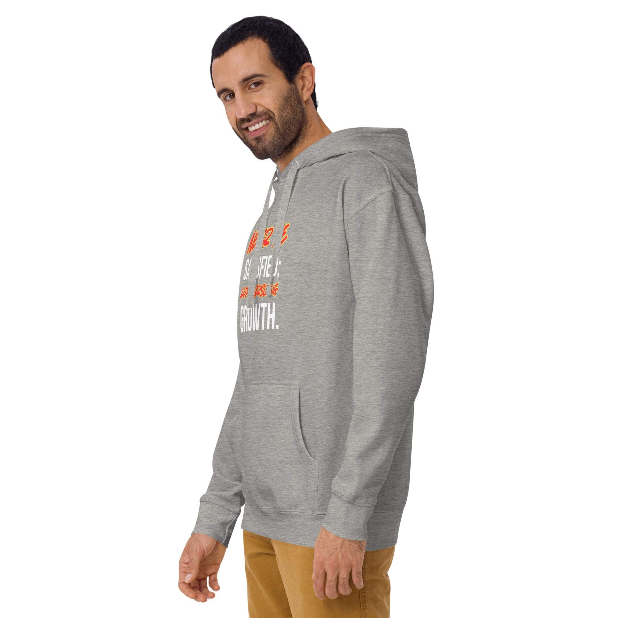 Man wearing grey "Keep Seeking Growth" motivational hoodie standing and smiling