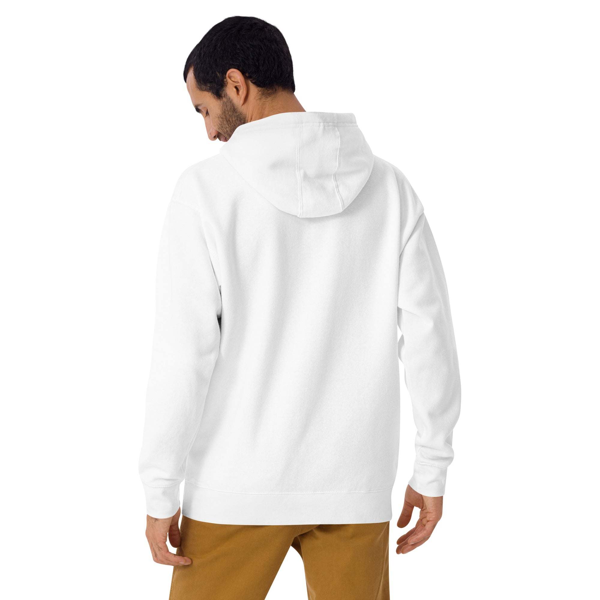 Back view of man wearing white Keep Seeking Growth Hoodie with hood up and brown pants