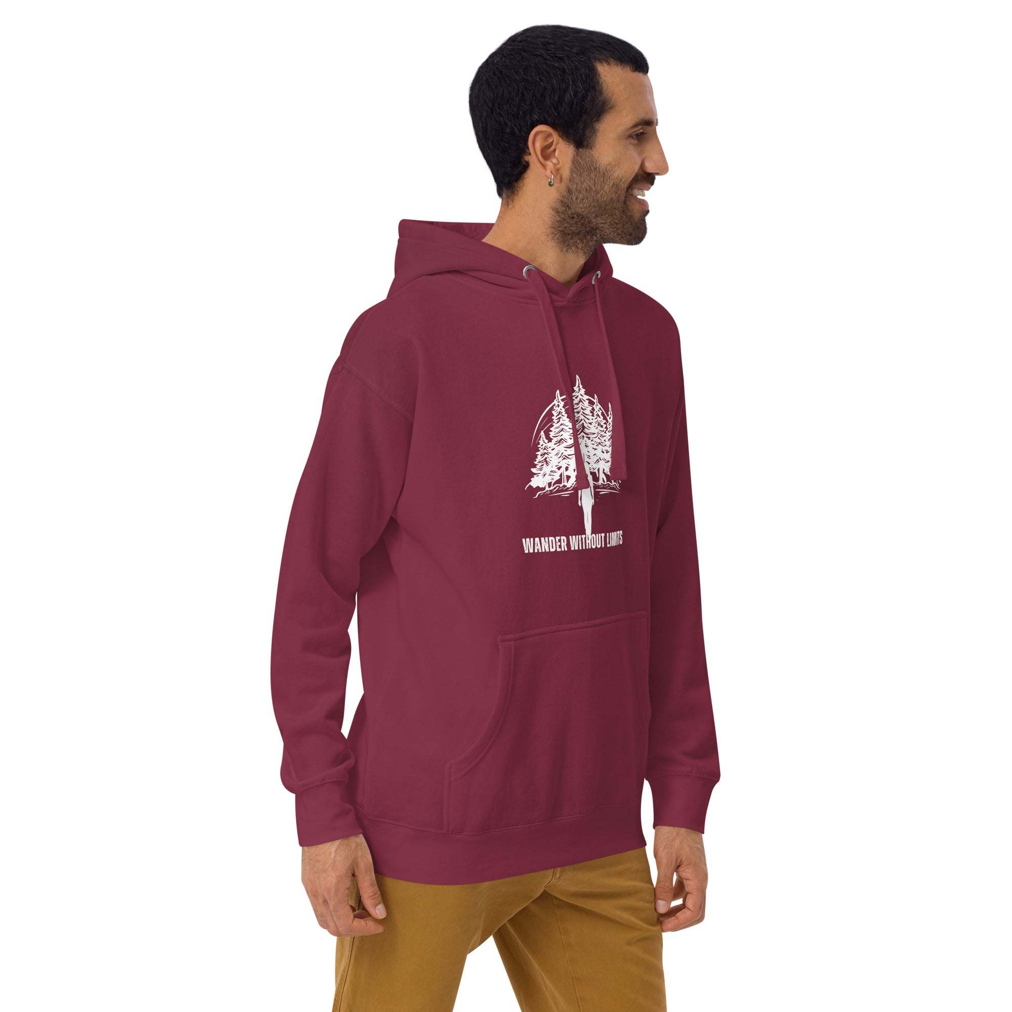 Man wearing maroon Wander Without Limits Hoodie with wilderness tree graphic and front pocket