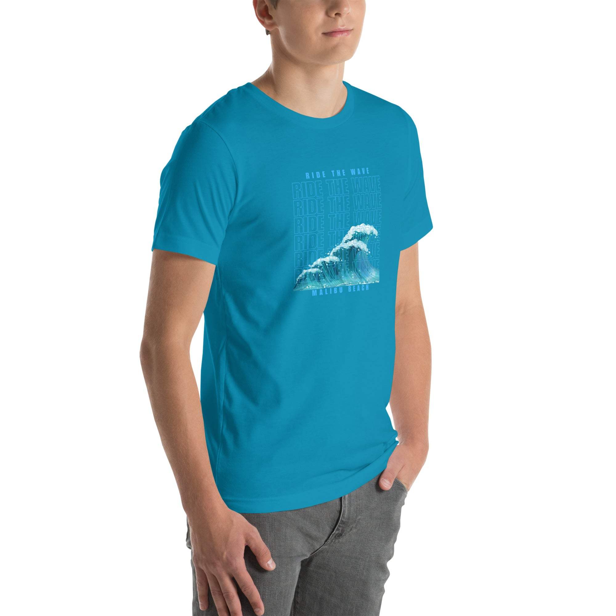 Man wearing blue Ride the Wave T-Shirt with wave graphic and text on front