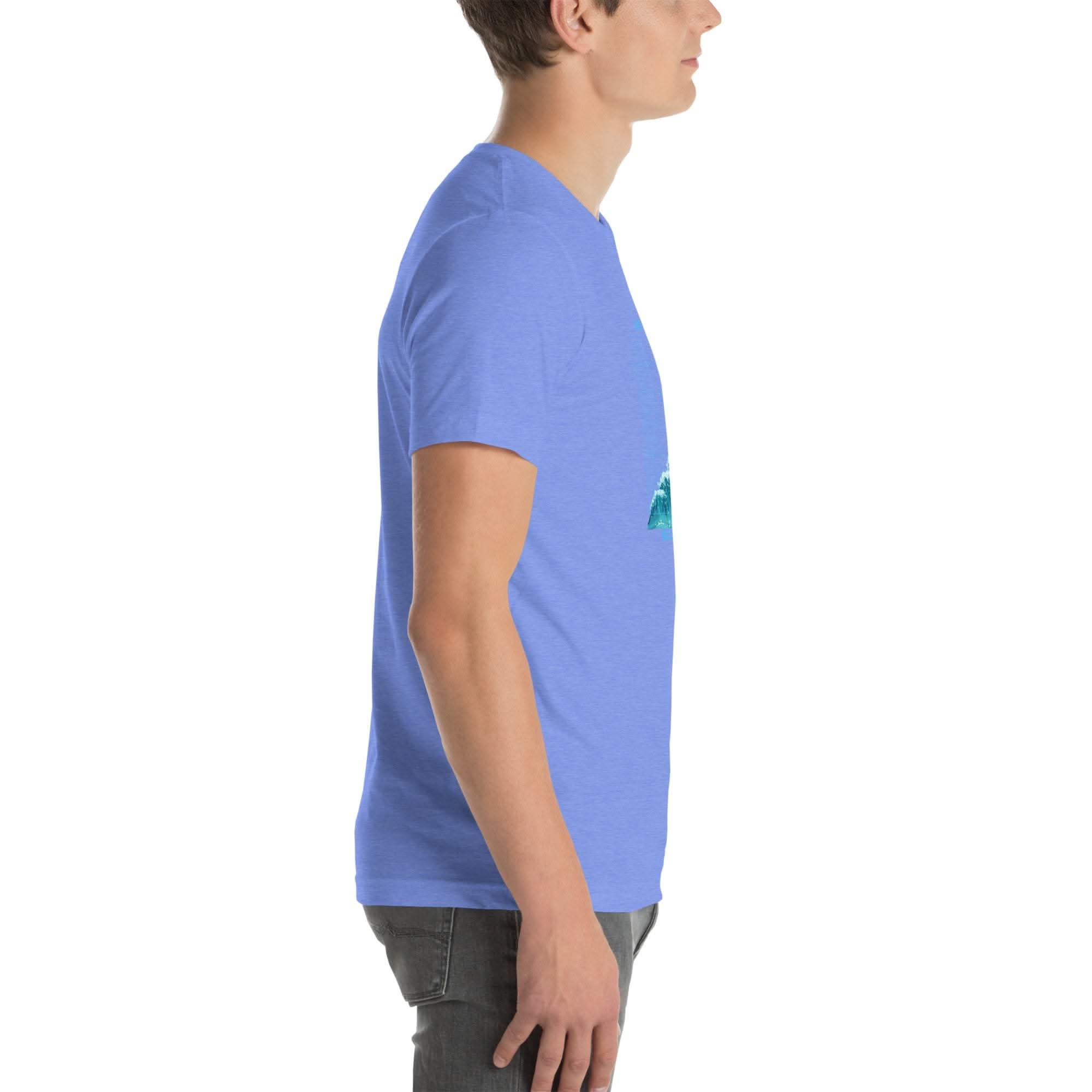 Side view of a man wearing a blue Ride the Wave T-Shirt with a wave-inspired design