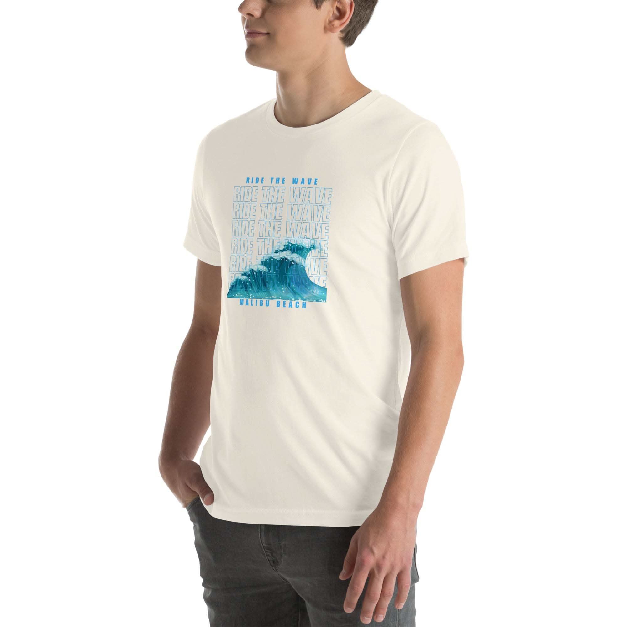 Man wearing white Ride the Wave T-Shirt with blue wave graphic and text design