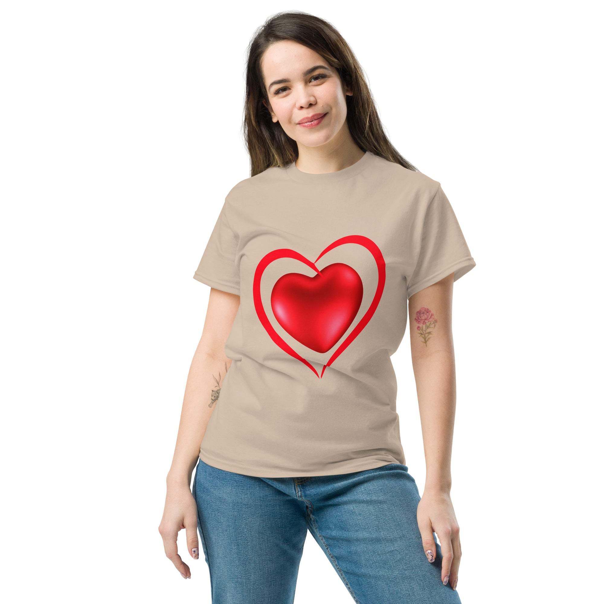 Woman wearing beige heart t-shirt with red heart graphic in casual pose