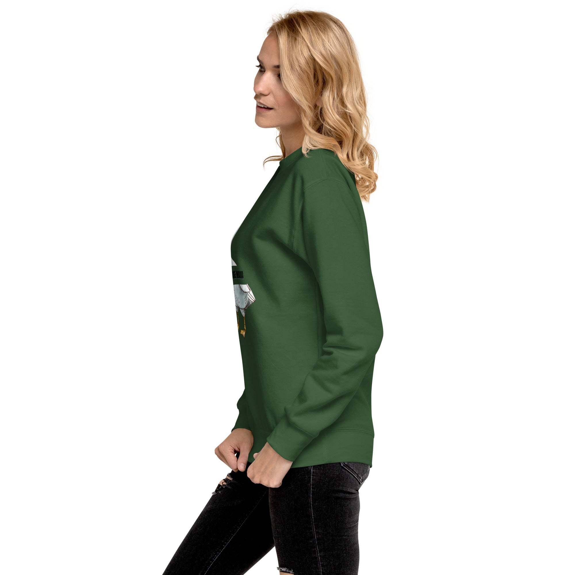 Woman wearing green Silly Goose Mama Sweatshirt with goose illustration and casual black jeans side view