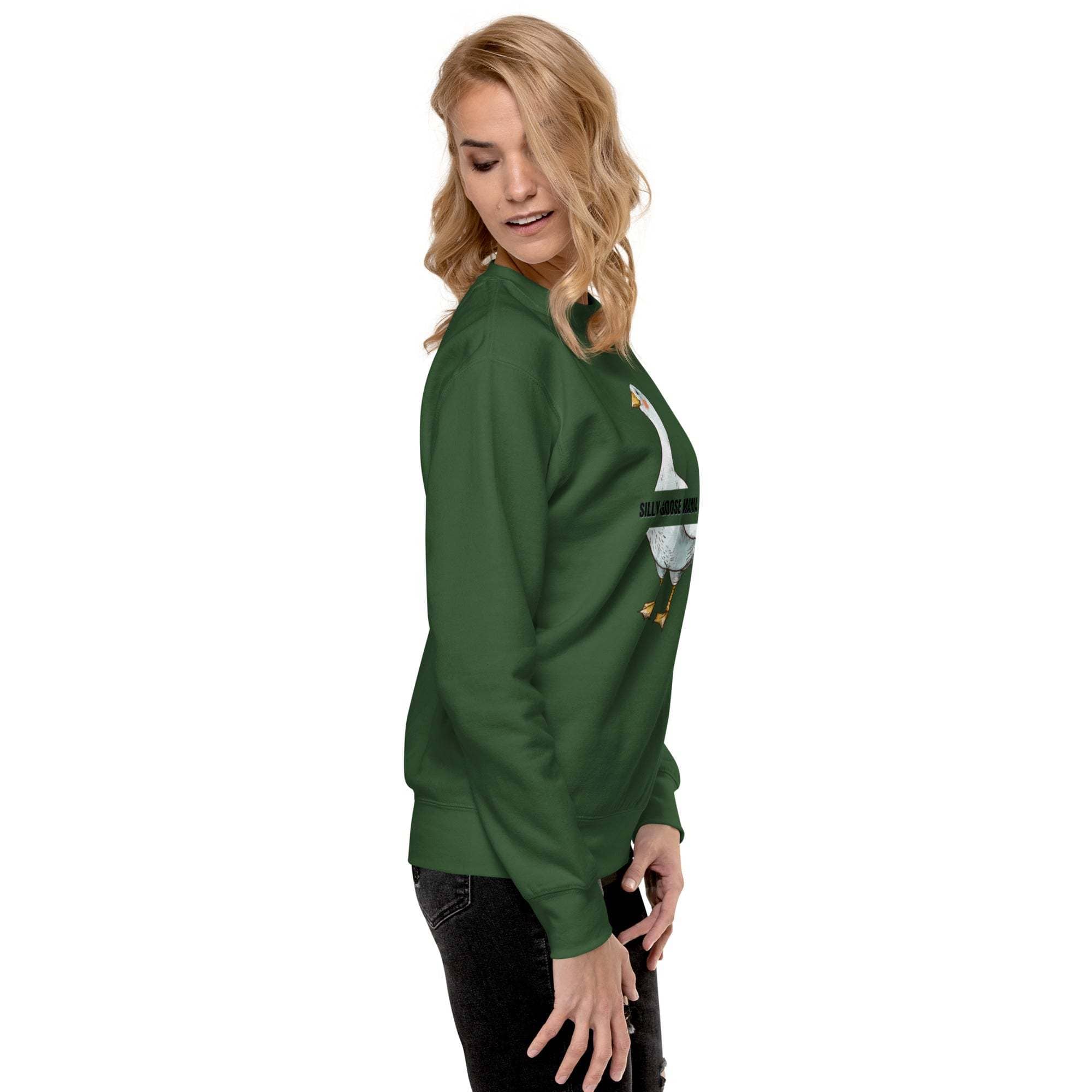 Woman wearing green Silly Goose Mama sweatshirt with goose illustration and text, casual cozy style