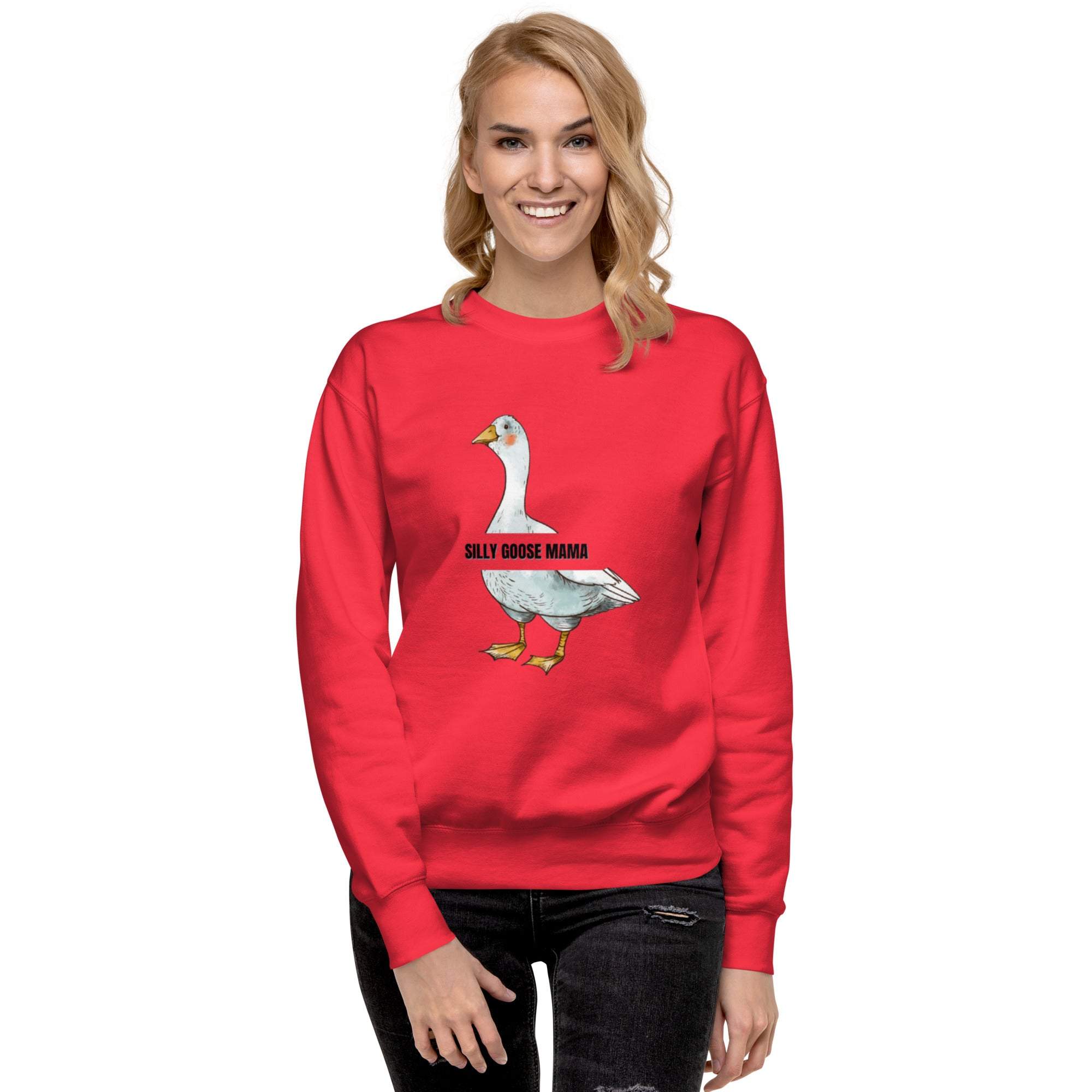 Red Silly Goose Mama Sweatshirt with goose illustration and playful text worn by smiling woman