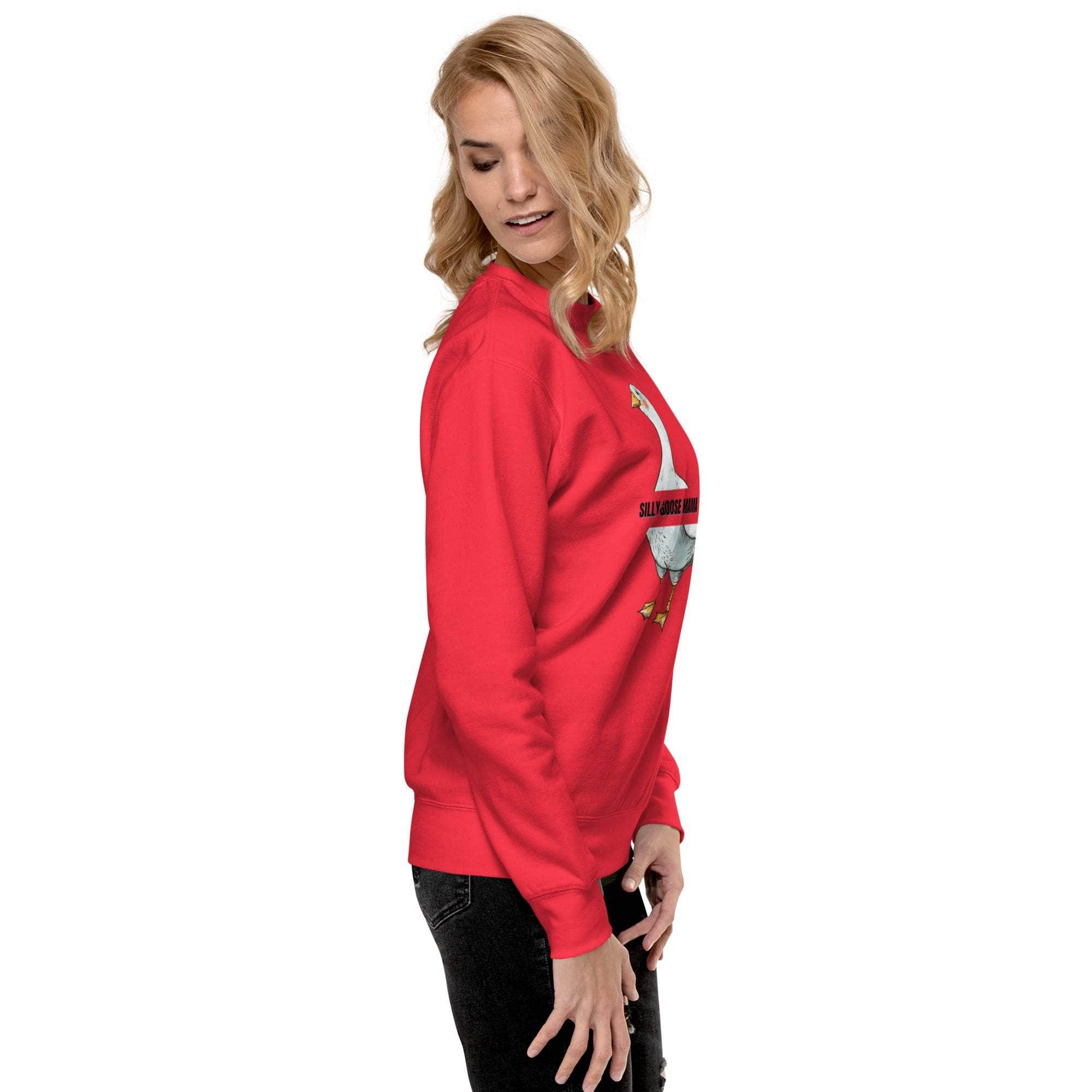 Woman wearing red Silly Goose Mama Sweatshirt with playful goose illustration, side view
