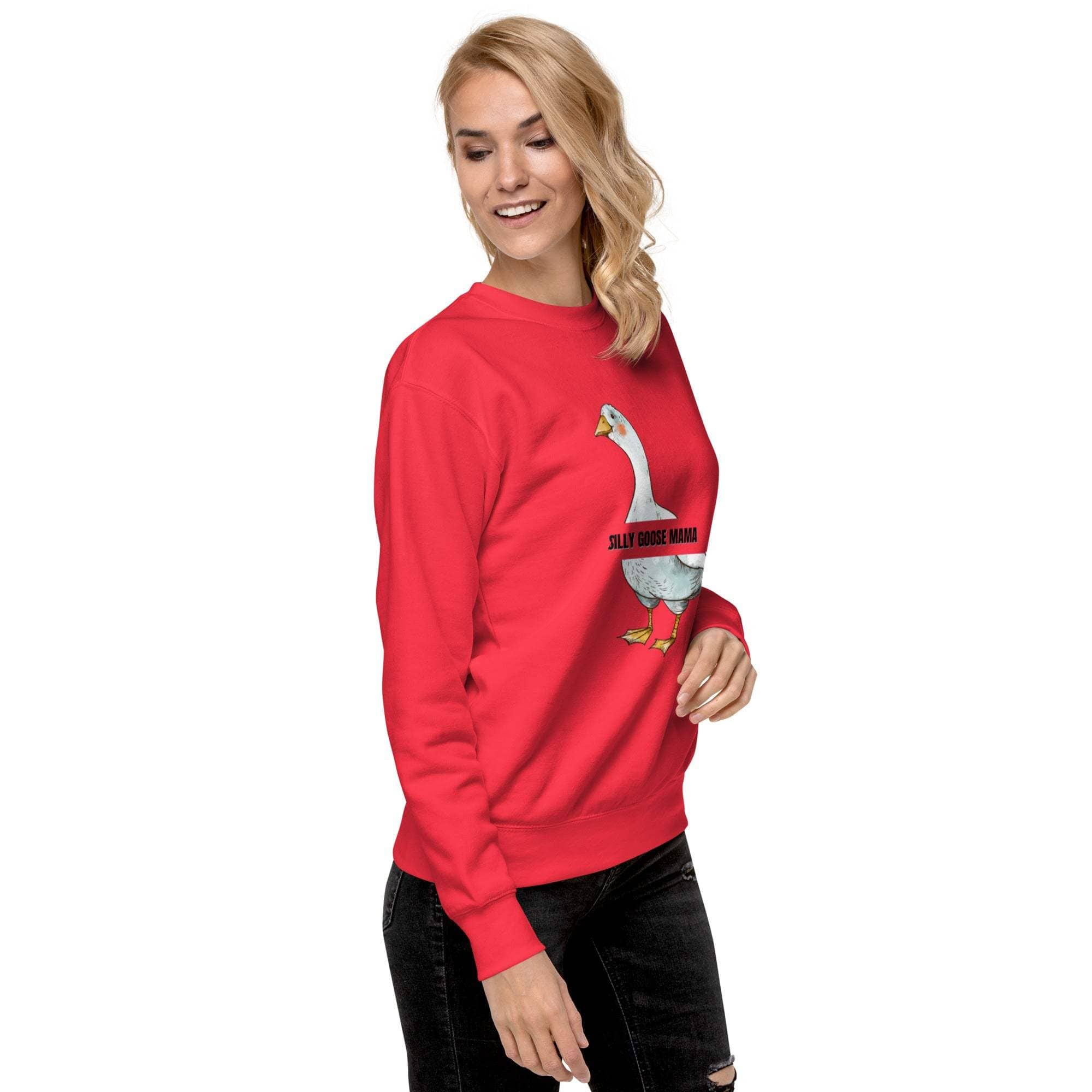 Woman wearing red Silly Goose Mama Sweatshirt with goose illustration and text on front