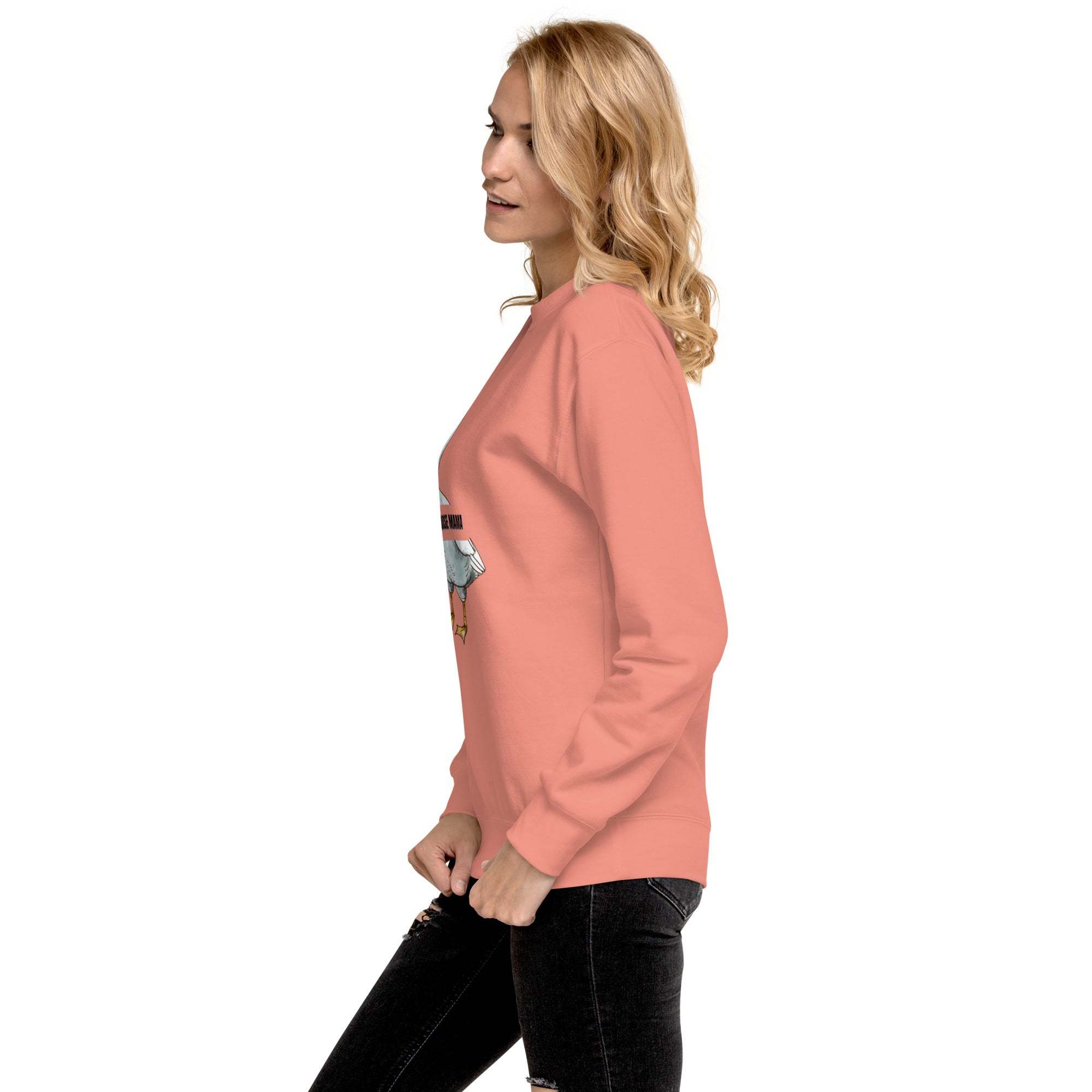 Woman wearing pink Silly Goose Mama Sweatshirt with goose illustration, side view, casual cozy style