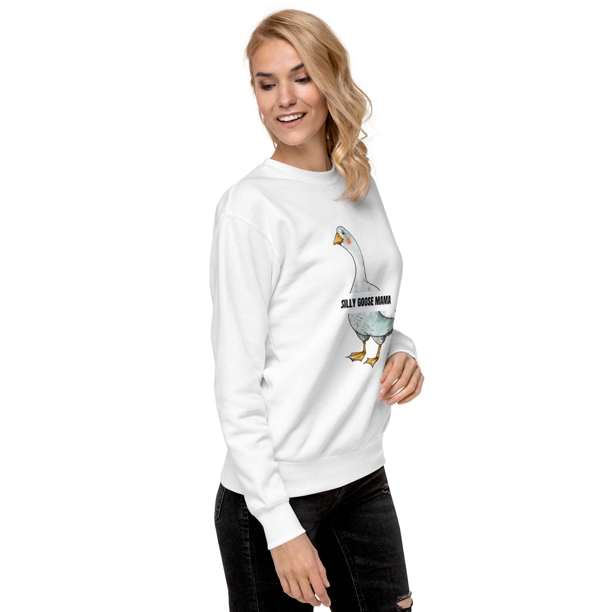 Woman wearing white Silly Goose Mama sweatshirt with goose illustration and text, paired with black jeans