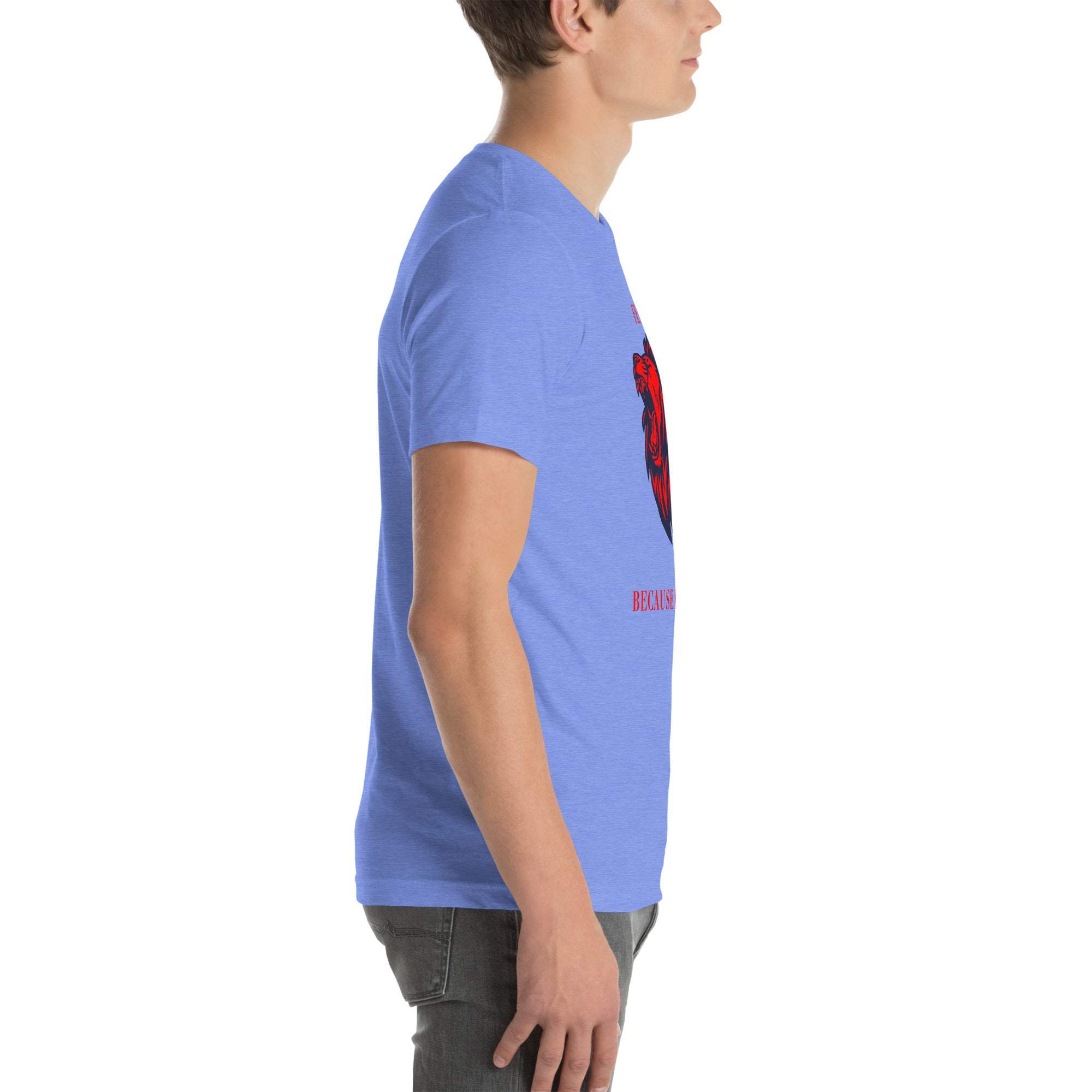 Side view of man wearing blue Fearless Lion T-Shirt with red lion head design and motivational text