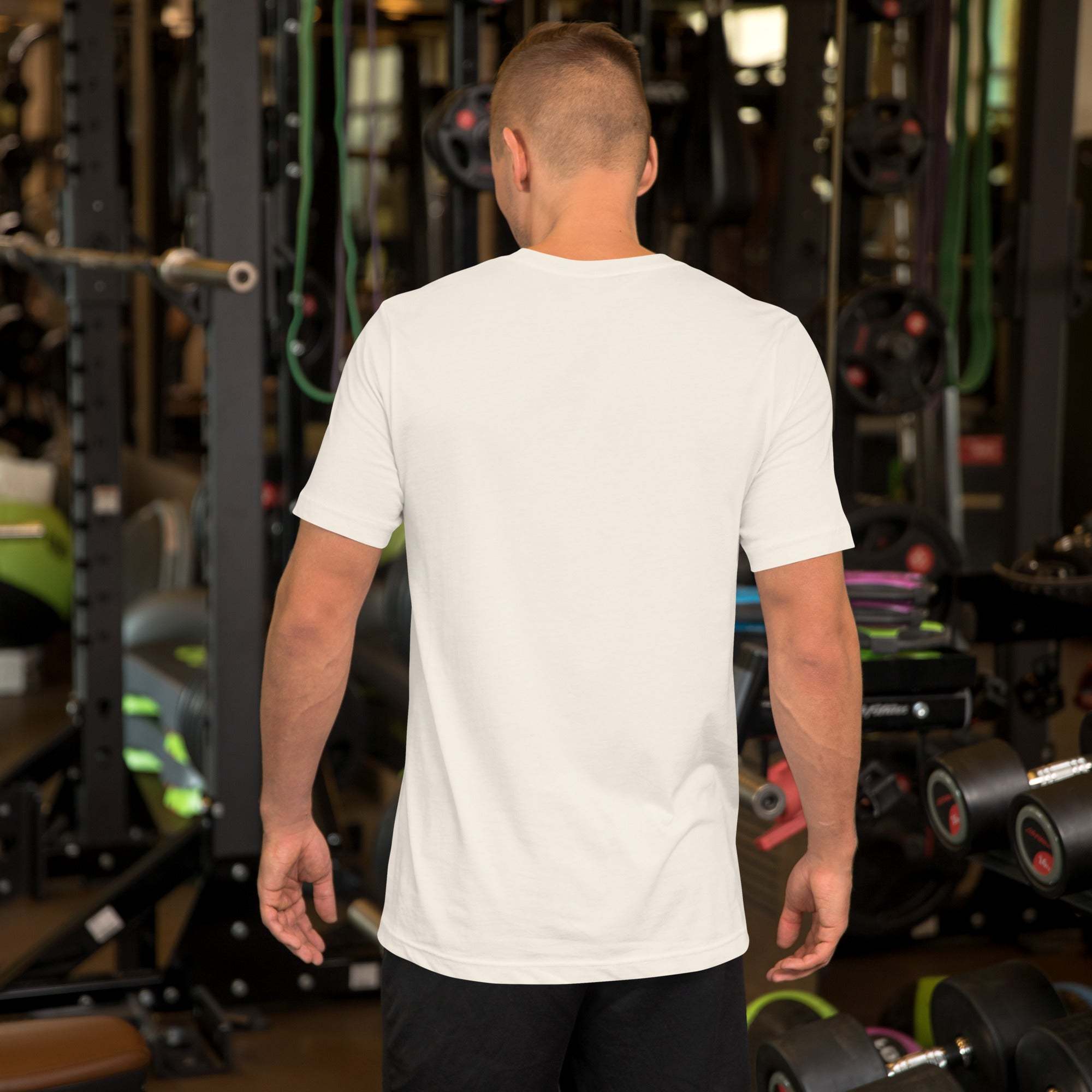 Back view of man wearing plain white Father's Day T-Shirt in gym setting