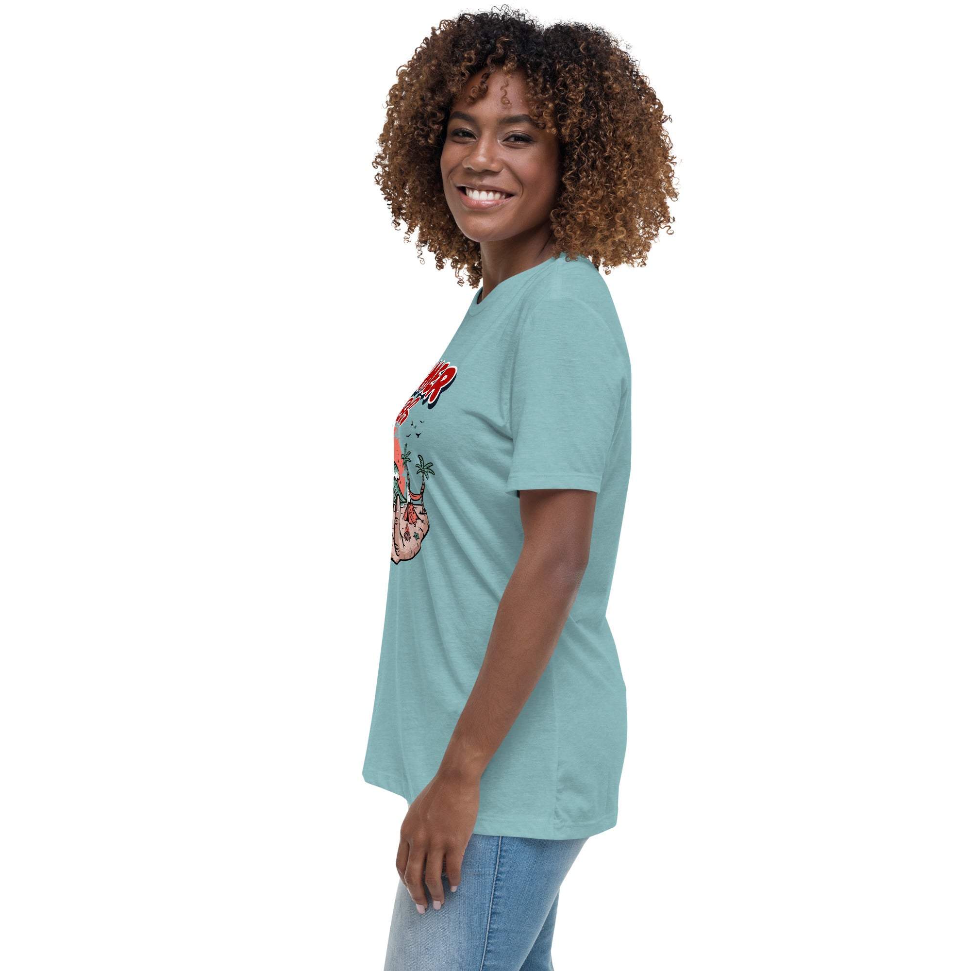 Woman wearing a blue Summer Vibes T-Shirt with retro beach graphic on the front.