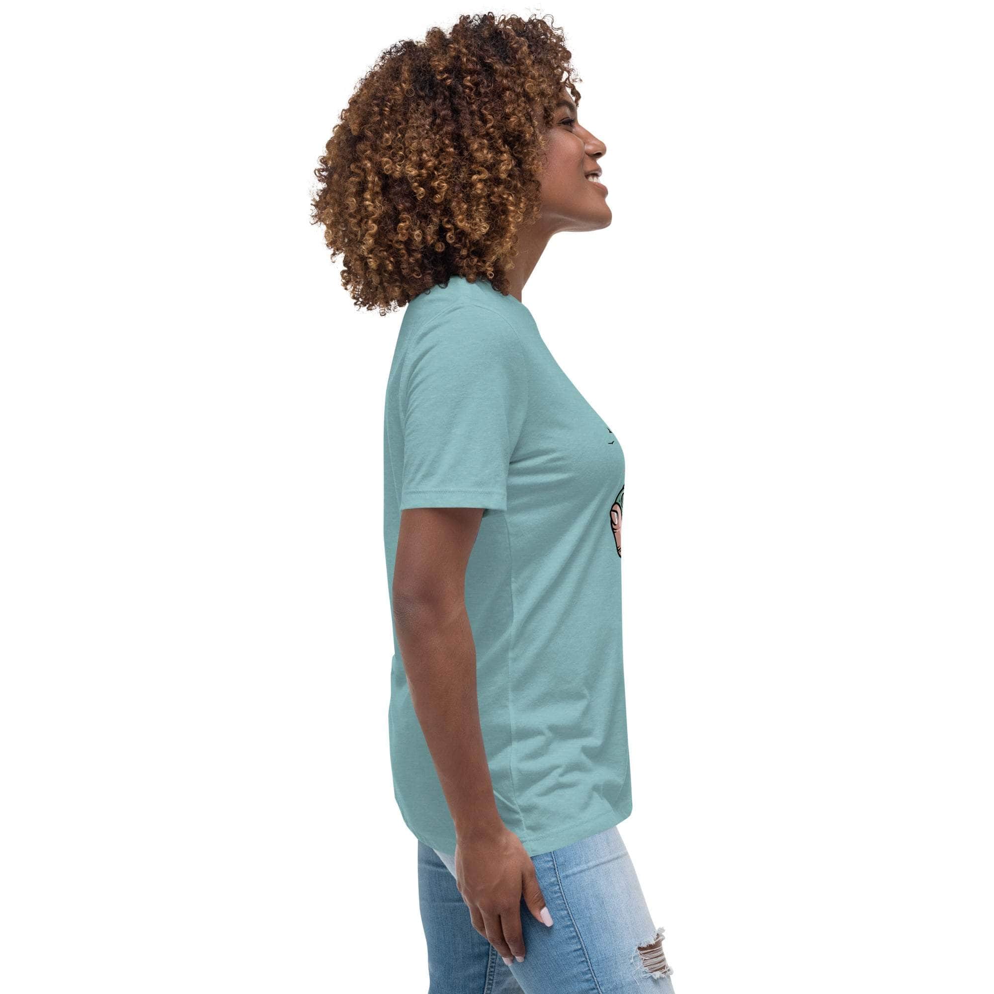 Woman wearing light blue Summer Vibes T-Shirt with retro beach graphic, side view