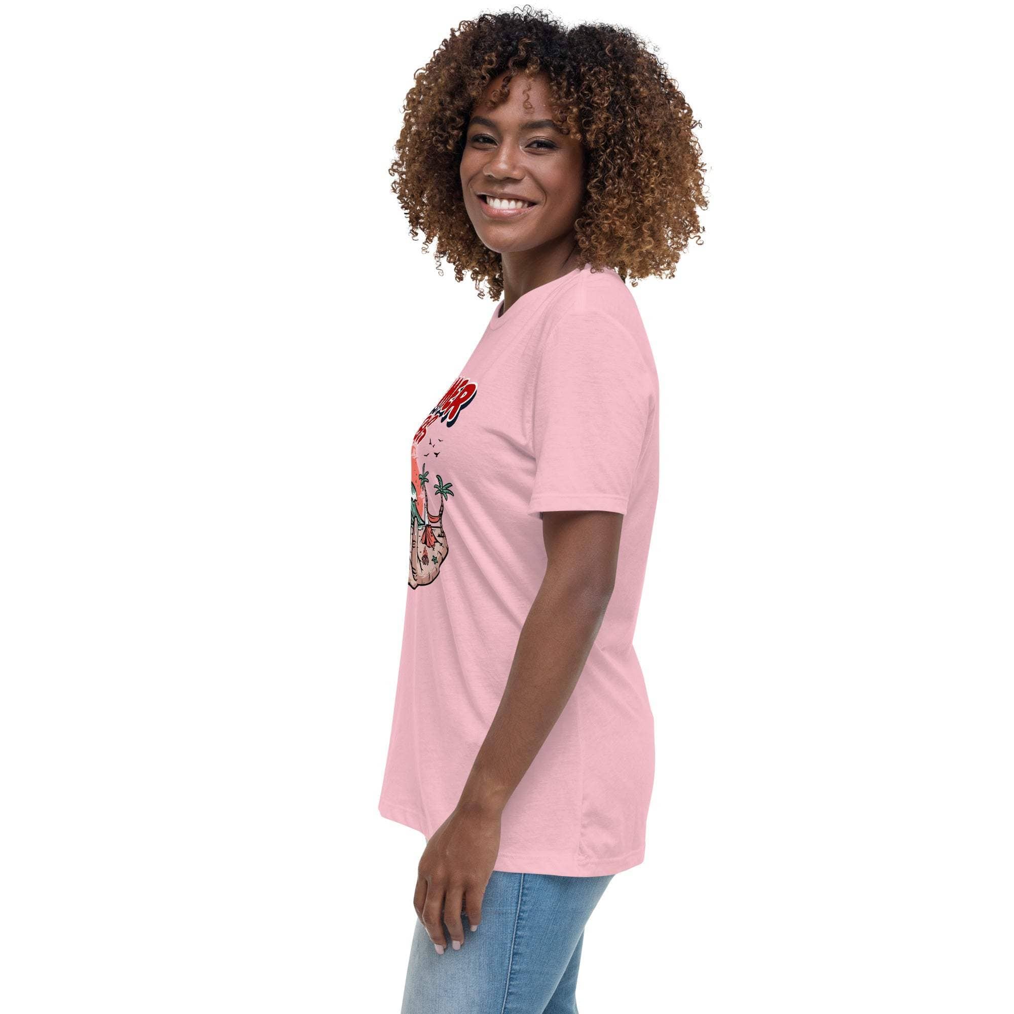 Smiling woman wearing a pink Summer Vibes T-Shirt with retro beach graphic on a white background