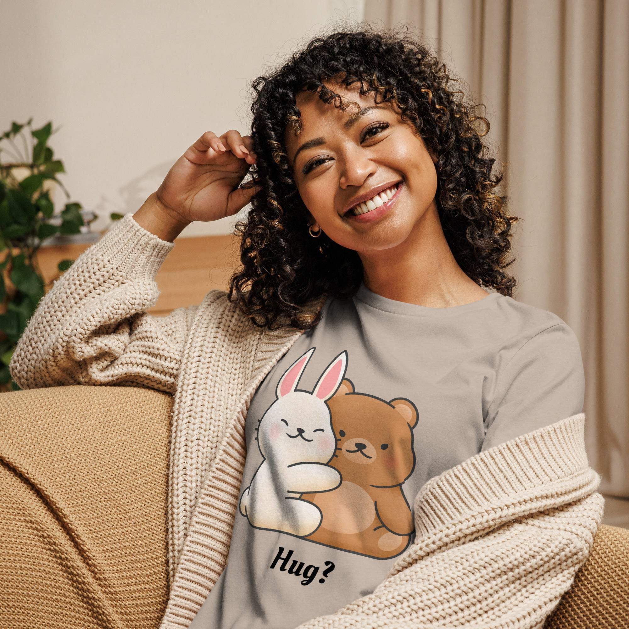 Woman wearing a Cute Bunny and Bear Hug T-Shirt featuring a pastel kawaii design of a bunny and bear hugging with the text "Hug?"
