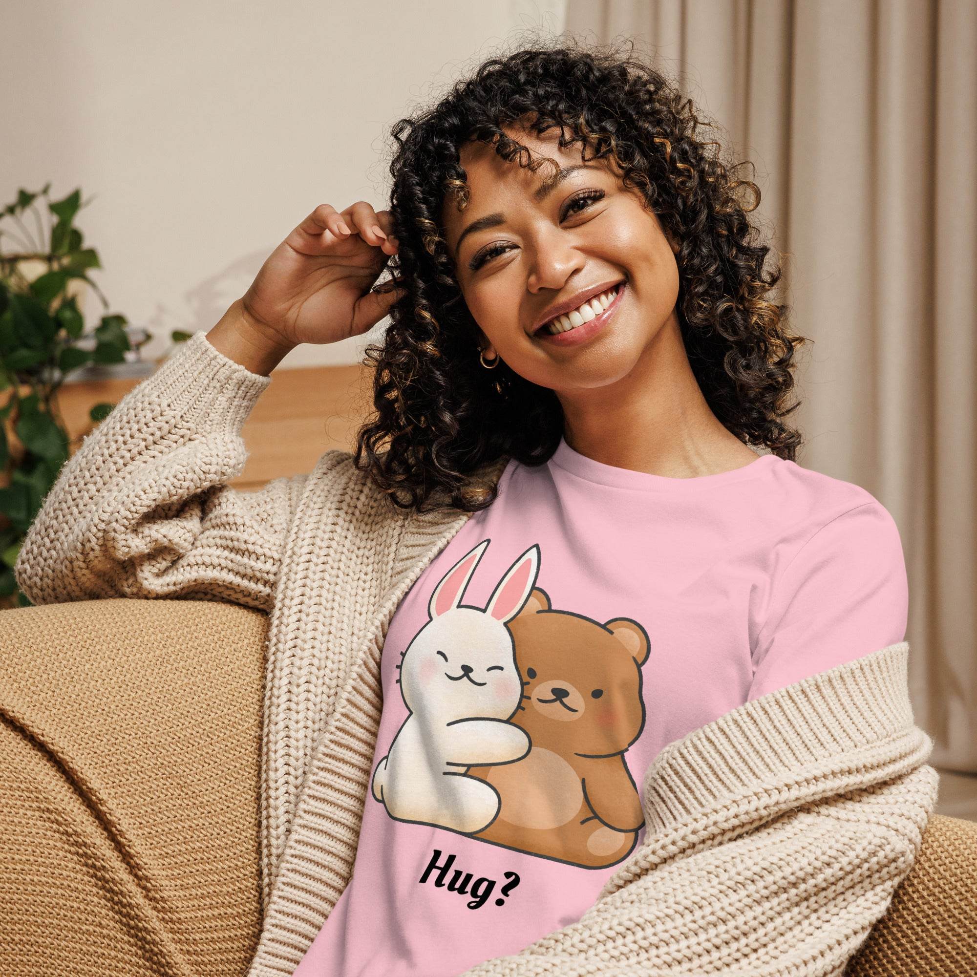 Woman wearing pink Cute Bunny and Bear Hug T-Shirt with cartoon bunny and bear hugging design