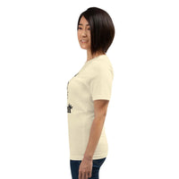 Woman wearing beige Real Queen T-Shirt with crown graphic and statement text side view